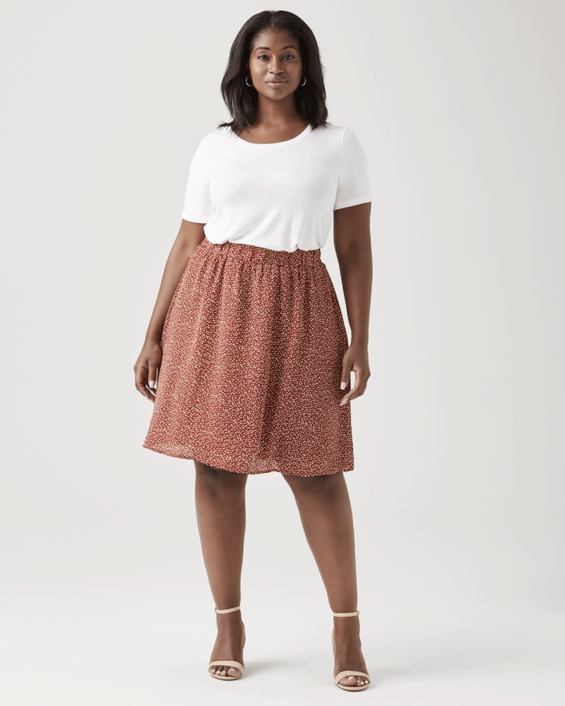 Plus size model with pear body shape wearing Orchid A-Line Flowy Skirt by Ryan Wylde | Dia&Co | dia_product_style_image_id:129465